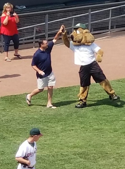 Dentist high fiving mascot