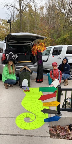 Dental team members and kids at fall community event