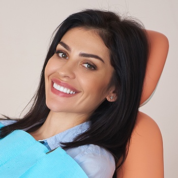 Woman smiling after in practice teeth whitening