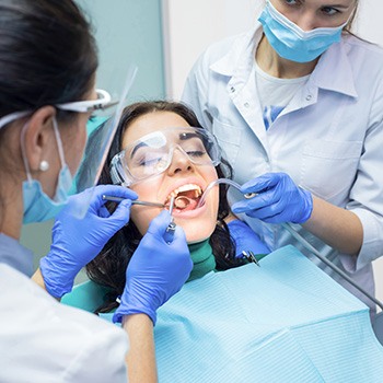 Woman having her teeth worked on