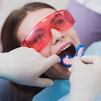 Patient receiving fluoride treatment