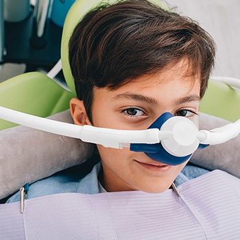 Patient with nitrous oxide dental sedation mask