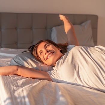 Woman waking feeling rested