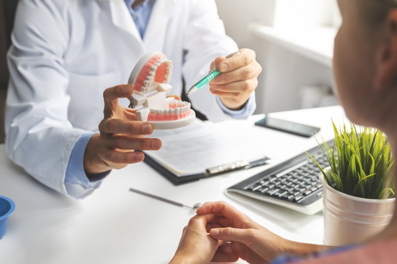 patient consulting a dentist in Dyer