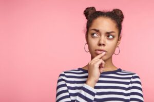 Woman wondering what type of floss to use